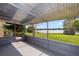 Enjoy serene lake views from the screened patio, a perfect spot for relaxation at 3065 Bridgehampton Ln, Orlando, FL 32812