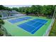 Aerial view of community tennis courts at 3065 Bridgehampton Ln, Orlando, FL 32812