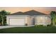 Charming single-story home with a two-car garage and well-manicured landscaping at 3245 Ellsworth Ave, Davenport, FL 33837