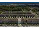 Aerial view of townhomes, showing close proximity to nearby lake at 3335 Azolla St, Orlando, FL 32808