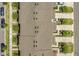 Overhead aerial view of townhome rooftops, manicured landscaping, and street parking at 3335 Azolla St, Orlando, FL 32808