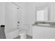 Clean bathroom with a shower-tub combination and a vanity with a white countertop at 3335 Azolla St, Orlando, FL 32808