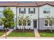 Charming townhouse with well-maintained lawn and manicured landscaping in a desirable community at 3335 Azolla St, Orlando, FL 32808