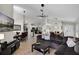 Open concept living space with dining and living room at 339 Holborn Loop, Davenport, FL 33897