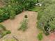 Wide aerial perspective revealing a large field featuring mature oak trees and a charming gazebo on the property at 4802 Anton Ave, Apopka, FL 32712