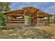 Spacious barn with a metal roof and multiple stalls, perfect for housing animals or storing equipment at 4802 Anton Ave, Apopka, FL 32712