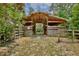 Exterior view of a charming barn with a rustic wooden structure, offering potential for agricultural or storage purposes at 4802 Anton Ave, Apopka, FL 32712