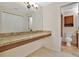 Bathroom with large counter space and cabinets adjacent to a toilet and shower at 4952 Tangerine Ave # 4952, Winter Park, FL 32792