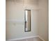 Empty closet with metal storage shelves and a full-length mirror at 4952 Tangerine Ave # 4952, Winter Park, FL 32792