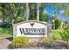 Wrenwood Condominiums sign with lush landscaping at 4952 Tangerine Ave # 4952, Winter Park, FL 32792