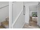 Bright hallway features wood-look flooring and leads to living area at 4952 Tangerine Ave # 4952, Winter Park, FL 32792