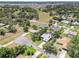 Birds eye view of the home's location within a quiet neighborhood and lush landscaping at 5382 Sw 84Th Pl, Ocala, FL 34476