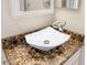 Close up of the bathroom sink and counter with marble countertop, and modern faucet at 5382 Sw 84Th Pl, Ocala, FL 34476