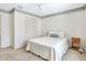 Cozy bedroom featuring a full sized bed, nightstand, ceiling fan, and plenty of natural light at 5382 Sw 84Th Pl, Ocala, FL 34476