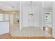 Welcoming foyer features tile flooring, contemporary lighting, and neutral decor at 5382 Sw 84Th Pl, Ocala, FL 34476