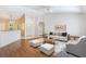 Bright living room boasts vaulted ceilings, recessed lighting, and neutral decor at 5382 Sw 84Th Pl, Ocala, FL 34476