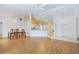 Open-concept living area features wood floors and ample space for entertaining at 5382 Sw 84Th Pl, Ocala, FL 34476