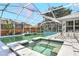 The covered pool area includes a hot tub at 5382 Sw 84Th Pl, Ocala, FL 34476