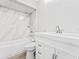 Bathroom with white marble-look shower and modern vanity at 540 Diane Cir, Casselberry, FL 32707