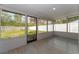 Enclosed back porch with view of the yard at 540 Diane Cir, Casselberry, FL 32707