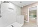 Modern shower with sleek tile and glass, creating a luxurious bathroom experience at 540 Diane Cir, Casselberry, FL 32707