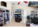 Cozy bedroom with access to a closet, a bathroom, and lots of natural light at 5671 Cypress Gardens Rd, Winter Haven, FL 33884
