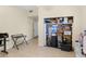 Open room with a desk and a walk-in closet stocked with storage boxes at 5671 Cypress Gardens Rd, Winter Haven, FL 33884