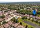Beautiful aerial view of home and community amenities including pool and pond at 879 Nonastone Run, Casselberry, FL 32707