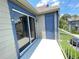 Balcony with railing offering green views at 936 Birmingham Ct # 200, Lake Mary, FL 32746
