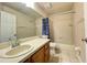 Bathroom featuring wood cabinets, tile floors, a shower-tub combination, and vanity at 936 Birmingham Ct # 200, Lake Mary, FL 32746