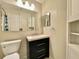 Bathroom featuring a black vanity with white countertop and cabinet storage at 936 Birmingham Ct # 200, Lake Mary, FL 32746