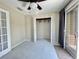 Bedroom featuring neutral carpet and paint, and a sliding glass door to the exterior at 936 Birmingham Ct # 200, Lake Mary, FL 32746