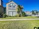 Attractive two-story condo building with manicured landscaping at 936 Birmingham Ct # 200, Lake Mary, FL 32746