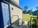 Charming condo entrance featuring a blue front door at 936 Birmingham Ct # 200, Lake Mary, FL 32746