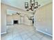 Vaulted living room with open floorplan, tile flooring, recessed lighting, and fireplace at 936 Birmingham Ct # 200, Lake Mary, FL 32746