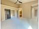 Spacious main bedroom with carpet flooring, walk-in closet, ceiling fan, and ensuite bathroom at 936 Birmingham Ct # 200, Lake Mary, FL 32746