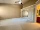 Bright main bedroom featuring neutral walls, carpet flooring, large closet, and ensuite bathroom at 936 Birmingham Ct # 200, Lake Mary, FL 32746