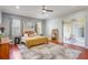 Spacious bedroom with large windows and plush carpet, offering a comfortable retreat at 9780 Cypress Pine St, Orlando, FL 32827