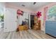 A pink bedroom featuring a closet with a sliding door, plenty of storage space and bright natural light at 985 N Village Dr, Deltona, FL 32725