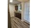 Kitchen with granite countertops, stainless steel appliances, and wood cabinets at 985 N Village Dr, Deltona, FL 32725