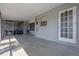 Enclosed patio with painted walls, window, and door, offering a versatile outdoor living space at 985 N Village Dr, Deltona, FL 32725