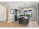 Dining room with wood floors and a chandelier fixture at 9873 Lost Creek Dr, Winter Garden, FL 34787
