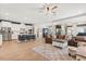 Open floor plan featuring living room, kitchen, and dining area at 9873 Lost Creek Dr, Winter Garden, FL 34787