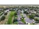 Aerial view of community surrounded by mature trees at 1131 Turtle Lake Ct, Ocoee, FL 34761