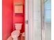 Bathroom featuring a toilet, storage cabinet, and glass-enclosed shower at 1131 Turtle Lake Ct, Ocoee, FL 34761