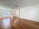 Large living area featuring hardwood floors and ample natural light at 1131 Turtle Lake Ct, Ocoee, FL 34761
