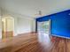 Spacious living room with a sliding glass door to outdoor screened area at 1131 Turtle Lake Ct, Ocoee, FL 34761
