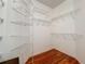 Walk-in closet featuring installed wire shelving for optimal organization at 1131 Turtle Lake Ct, Ocoee, FL 34761