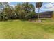 Expansive backyard with a built-in firepit, perfect for outdoor entertaining and gatherings at 120 E Greentree Ln, Lake Mary, FL 32746