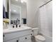 Charming bathroom features a sleek vanity, modern fixtures, and a shower-tub combination at 13822 Destin Beach Ln, Orlando, FL 32827